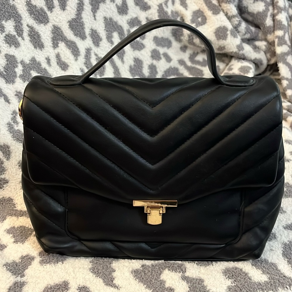 A new day black purse